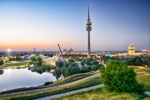 Panoramic view over the Olymic park (Olympiapark München) in Munich at sunset, Germany