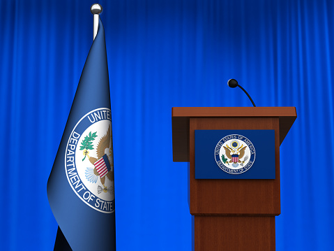 US State Department flag rostrum with microphone. Digitally generated image