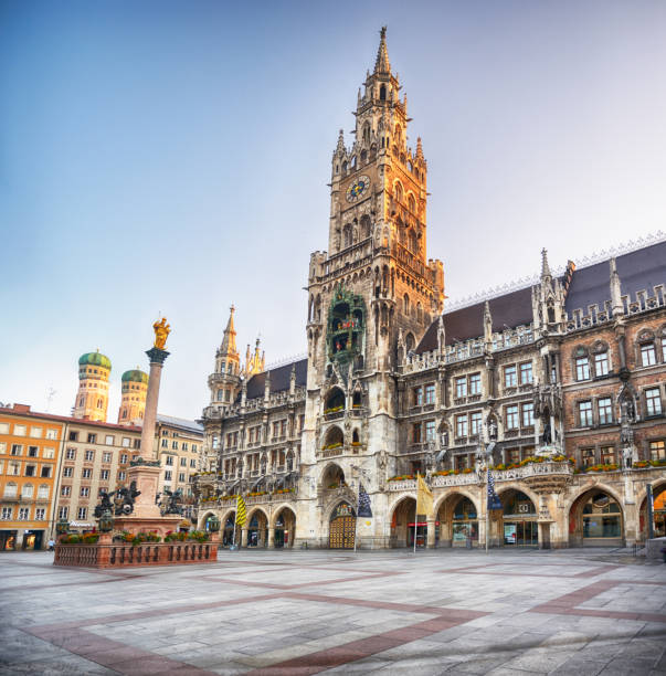 Marienplatz in Munich, Germany New Town Hall and St. Mary's Column at the Marienplatz in Munich, Bavaria, Germany. Composite photo munich city hall stock pictures, royalty-free photos & images