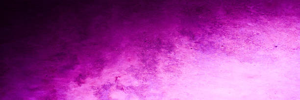 istock Black purple magenta pink background. Abstract. Light dark. Gradient. Painted old rough concrete wall texture. Toned stone background. Web banner. Wide. Long. Panjramic. 1416027883