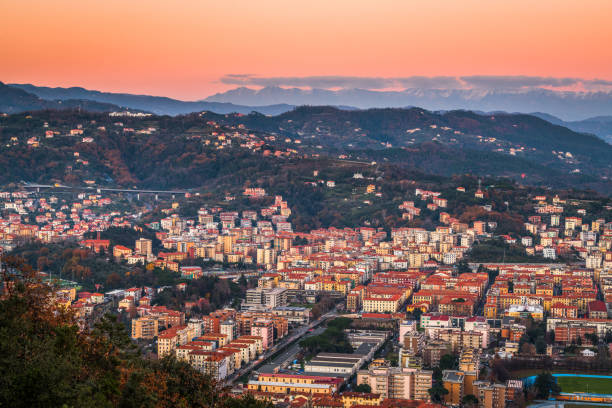 La Spezia, Italy Skyline La Spezia, Italy skyline and landscape with the mountains at dusk. spezia stock pictures, royalty-free photos & images