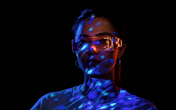 istock Metaverse VR virtual reality game playing, woman play metaverse virtual digital technology game control with VR goggle 1416029501