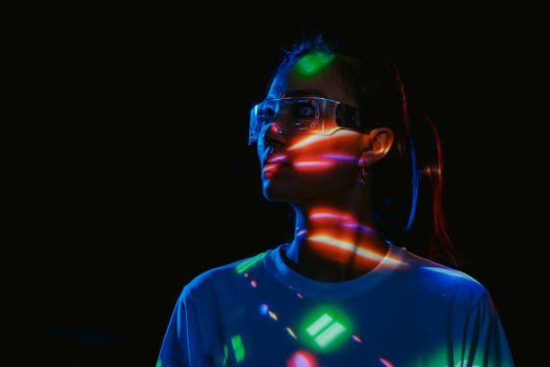 istock Metaverse VR virtual reality game playing, woman play metaverse virtual digital technology game control with VR goggle 1416029546