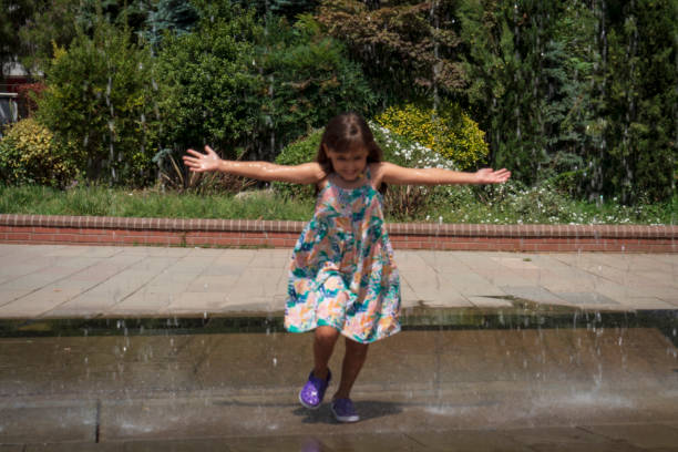 istock Cute little girl having fun outside 1416030451