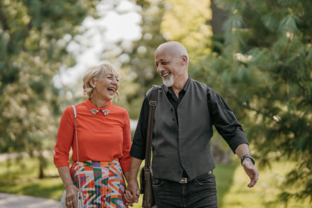 istock Happy mature couple in park 1416032109