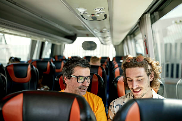 istock Father and son onboard motor coach 1416033313