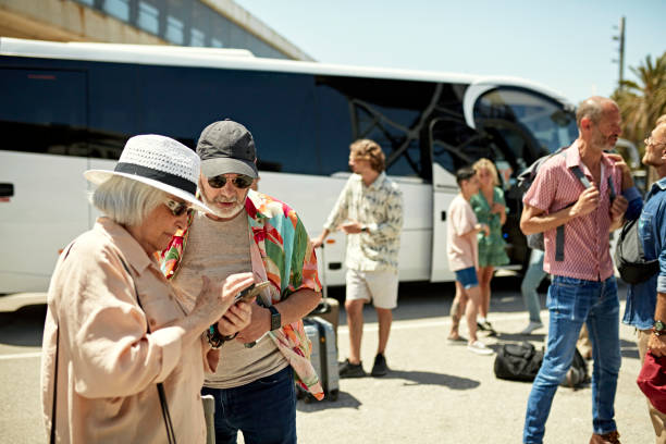 istock Diverse group of tourists awaiting coach trip 1416033331