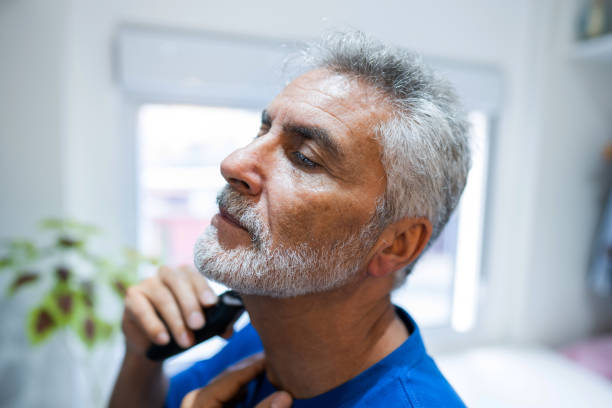 istock senior man shaving 1416034421