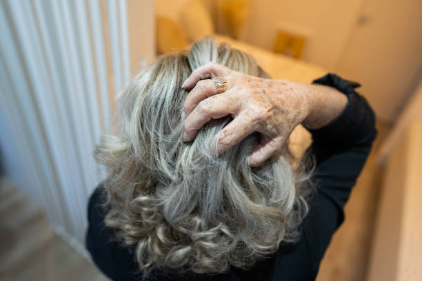 senior woman getting her hair done