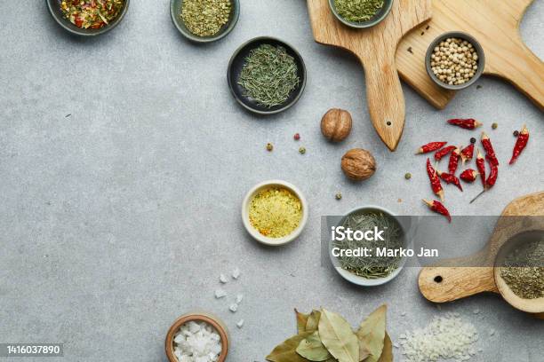 Spice And Seasoning On A Wooden Cutting Boards Stock Photo - Download Image Now - Spice, Table Top View, Backgrounds