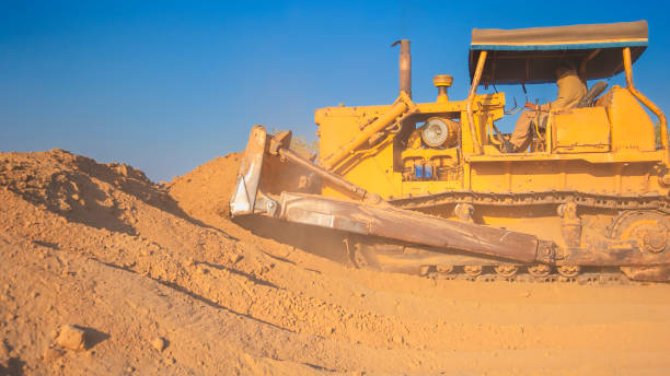 istock A bulldozer on work earthmoving, soil removing, earth working 1416038119