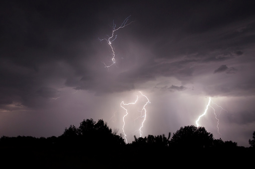 Lightning strikes at night during a severe thunderstorm over the city of Mendoza, Argentina