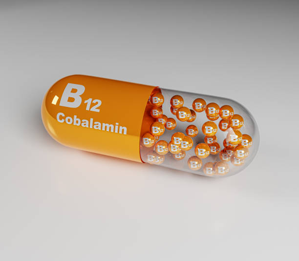 istock Vitamin B12, b12 text on globules, Cobalamin with white background, 3d illustration. 1416048041