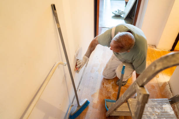 istock Senior man renovating apartment, using sandpaper 1416048621