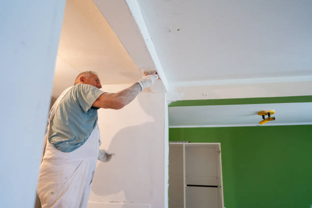 istock Senior man renovating house, using sandpaper 1416048774