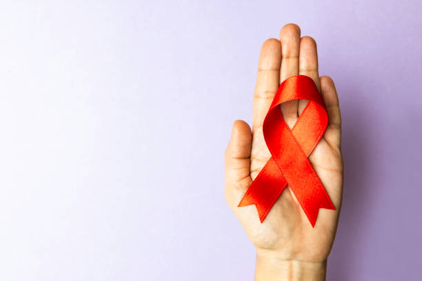 빨간색 인식 리본 - aids awareness ribbon 뉴스 사진 이미지