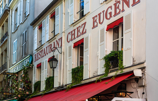 Paris, France - July 15th 2022: Chez Eugene, a  historic  restaurant in the heart of Montmartre in Paris