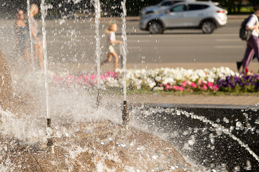 Summer heat.Hot summer at the fountains in the city.