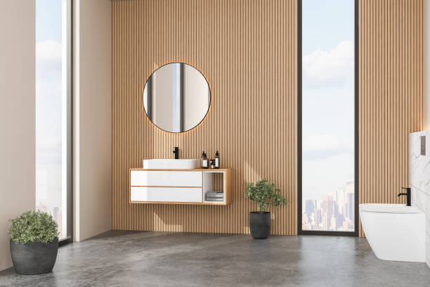 istock Modern bathroom interior with white and wooden walls, white basin 1416055591