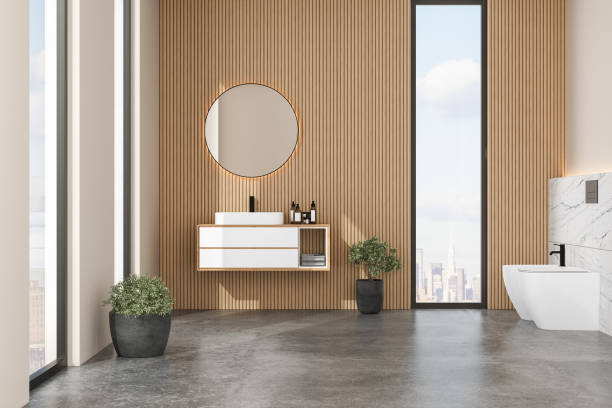 istock Modern bathroom interior with white and wooden walls, white basin 1416055658