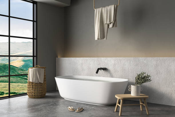 istock Modern Loft Bathroom interior design, white bathtub, concrete floor 1416055660