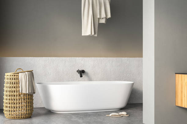 istock Modern Loft Bathroom interior design, white bathtub, concrete floor 1416057012