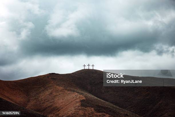 Three Crosses On Dark Hillside Stock Photo - Download Image Now - Religious Cross, Cross Shape, Jesus Christ