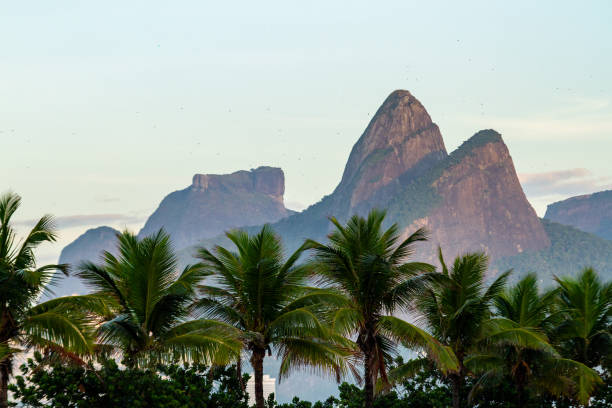 ipanema beach with two hill brother and gavea stone in Rio de Janeiro, Brazil. ipanema beach with two hill brother and gavea stone in Rio de Janeiro. two brothers mountain stock pictures, royalty-free photos & images