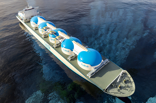 istock LNG - Liquified natural gas tanker with gas tanks powered with h2 hydrogen engines on the ocean, deliver LNG 1416060321