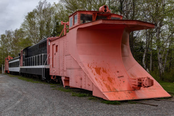 istock Wedge snow plow used to push snow off train tracks 1416068041