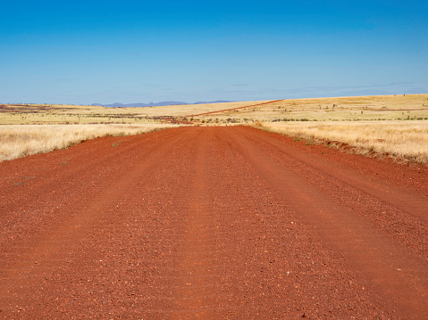 The red dirt roads of Millstream Chichester National Park in remote Western Australia