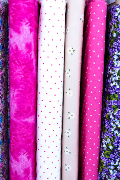 istock Printed Pink Cotton Fabrics Lined Up (Close-Up) 1416097816