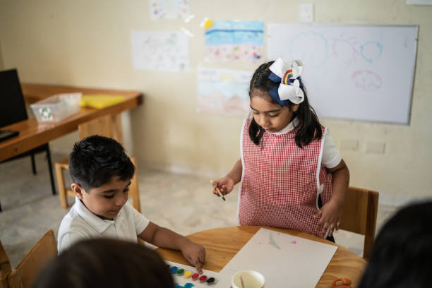 istock Students painting in the classroom at school 1416097817