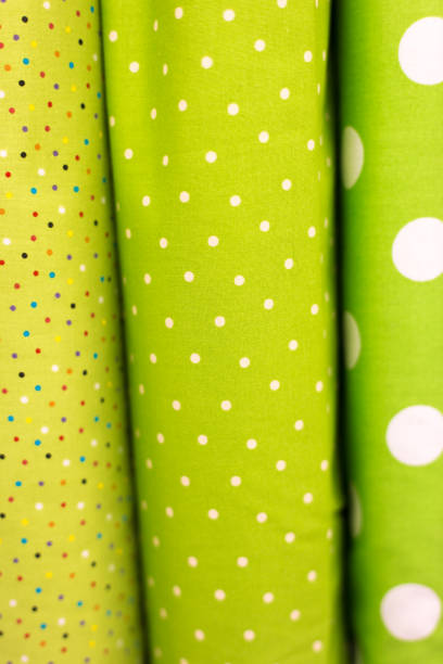 Printed Lime Green  Cotton Fabrics Lined Up (Close-Up)