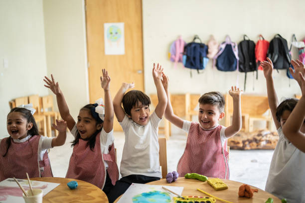 istock Students celebrating in the classroom 1416097860