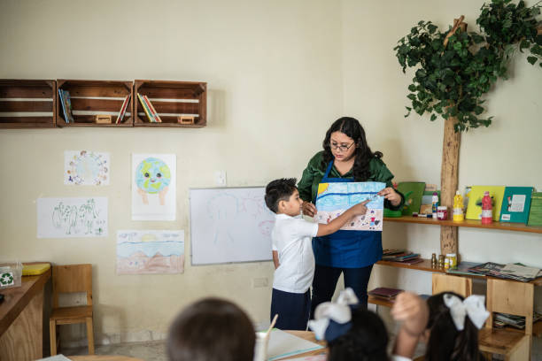 istock Schoolboy presentation in the classroom at school 1416097948