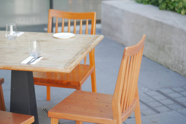istock empty chair and table outdoor 1416098912