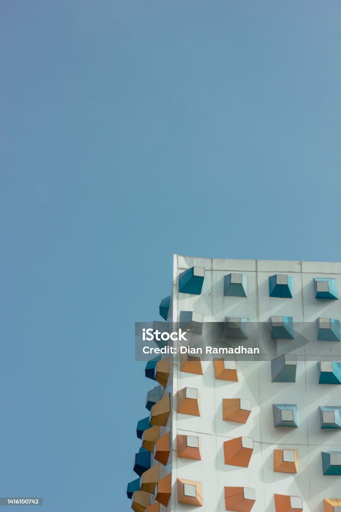 Minimalisme building Colorfull minimalisme building and blue sky Apartment Stock Photo