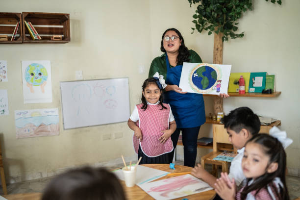 istock Schoolgirl presentation in the classroom at school 1416101992