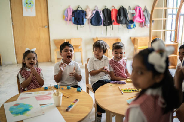 istock Students applauding a presentation by a schoolgirl in the classroom at school 1416102521