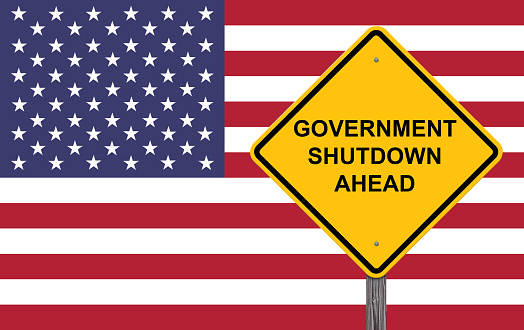 Government Shutdown Ahead Caution Sign - Flag Background