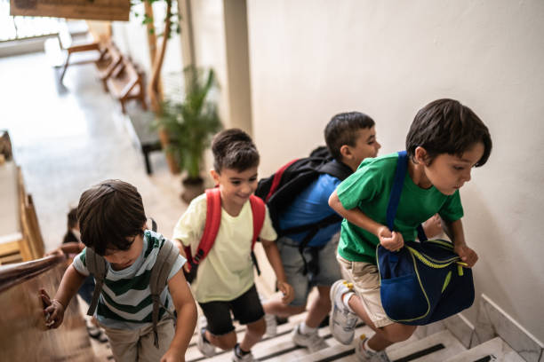 istock Students moving up stairs and arriving at school 1416117849