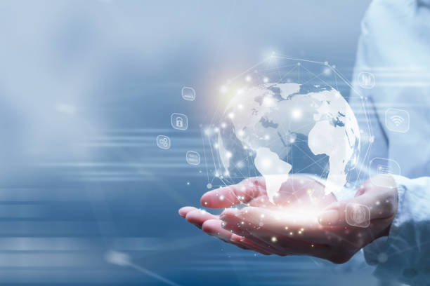 istock Businesswoman holding digital datas with world interface on hologram screen. 1416133690