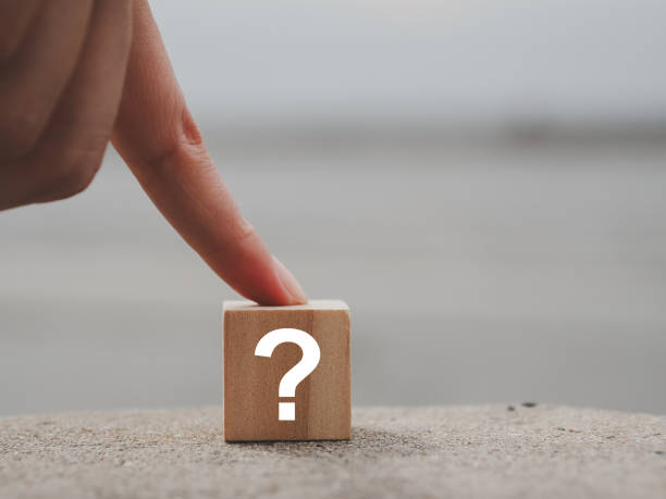 istock question mark on wooden block 1416150880