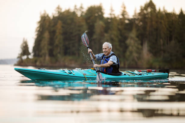 istock Senior Man Enjoying Kayaking in the Pacific Northwest 1416151689