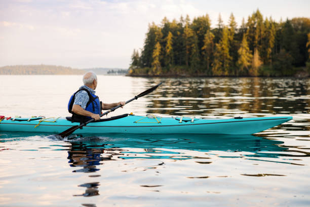 istock Senior Man Enjoying Kayaking in the Pacific Northwest 1416151764