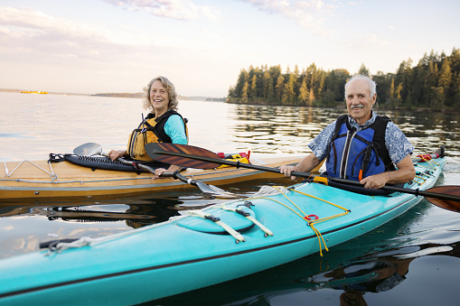 Senior Couple Enjoying Kayaking in the Pacific Northwest