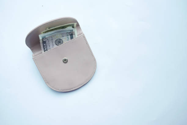 istock us dollar cash in leather on white background 1416154360