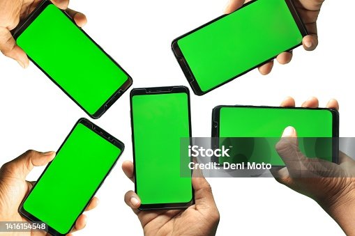 istock Small group people holding smartphone with green screen, transfer data concept 1416154548