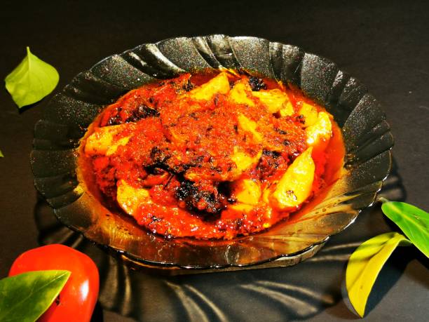 istock Fried sardines with potatoes and red chili sauce. 1416161712
